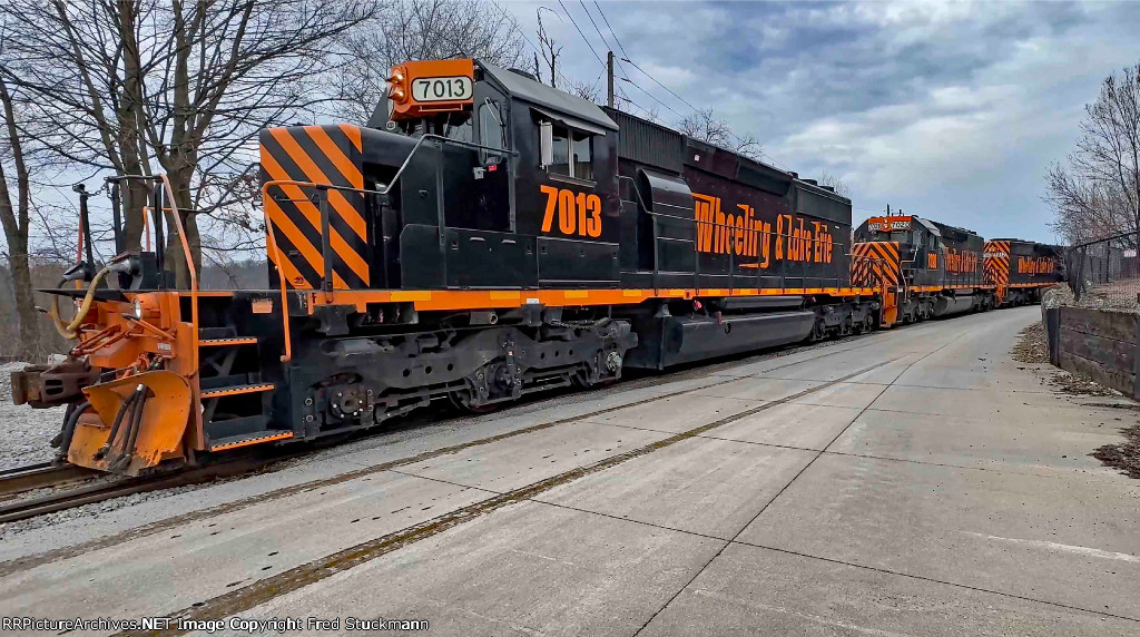 WE 7013 leads the train off the connection.